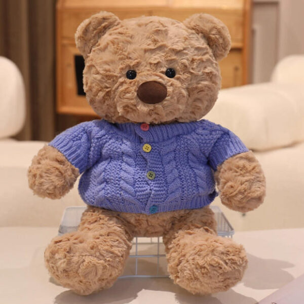 Suéter azul con oso de nariz grande 50cm